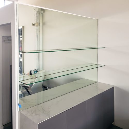 mirror with glass shelves
