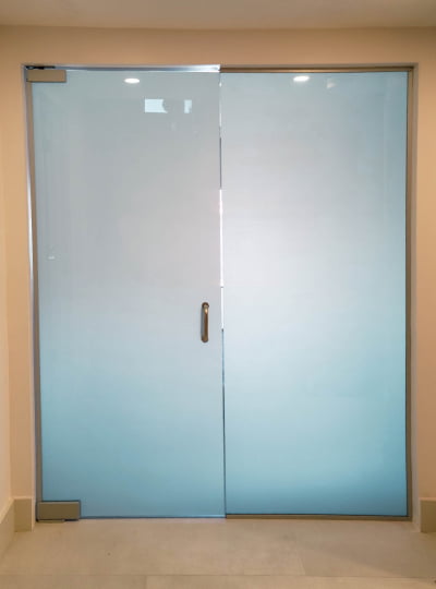Frosted glass doors in a modern interior setting