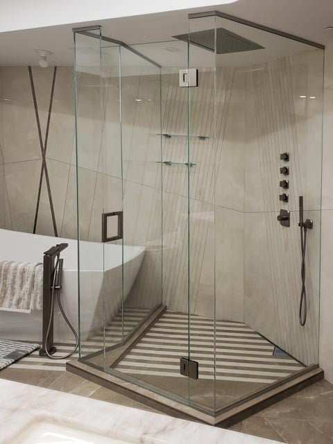 Luxurious modern bathroom featuring a spacious shower