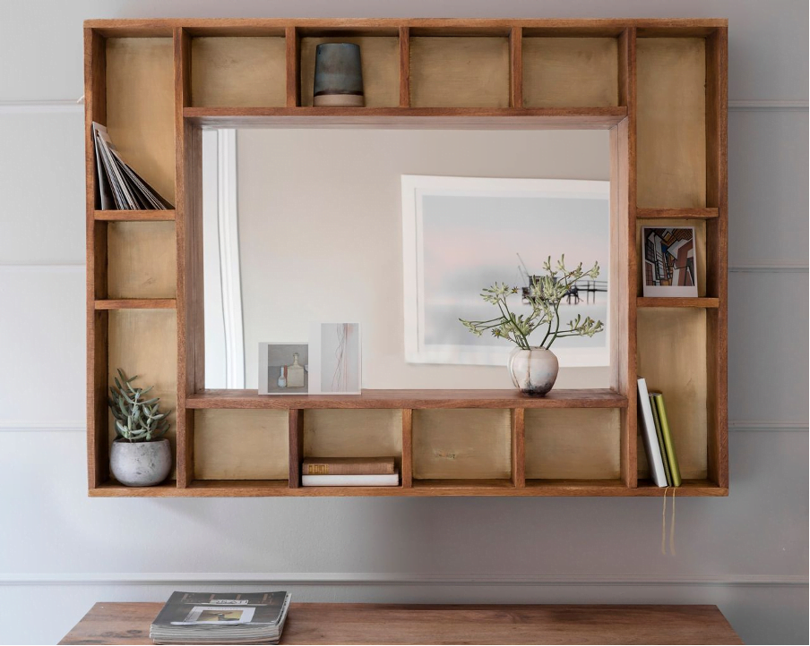 large mirror with shelf